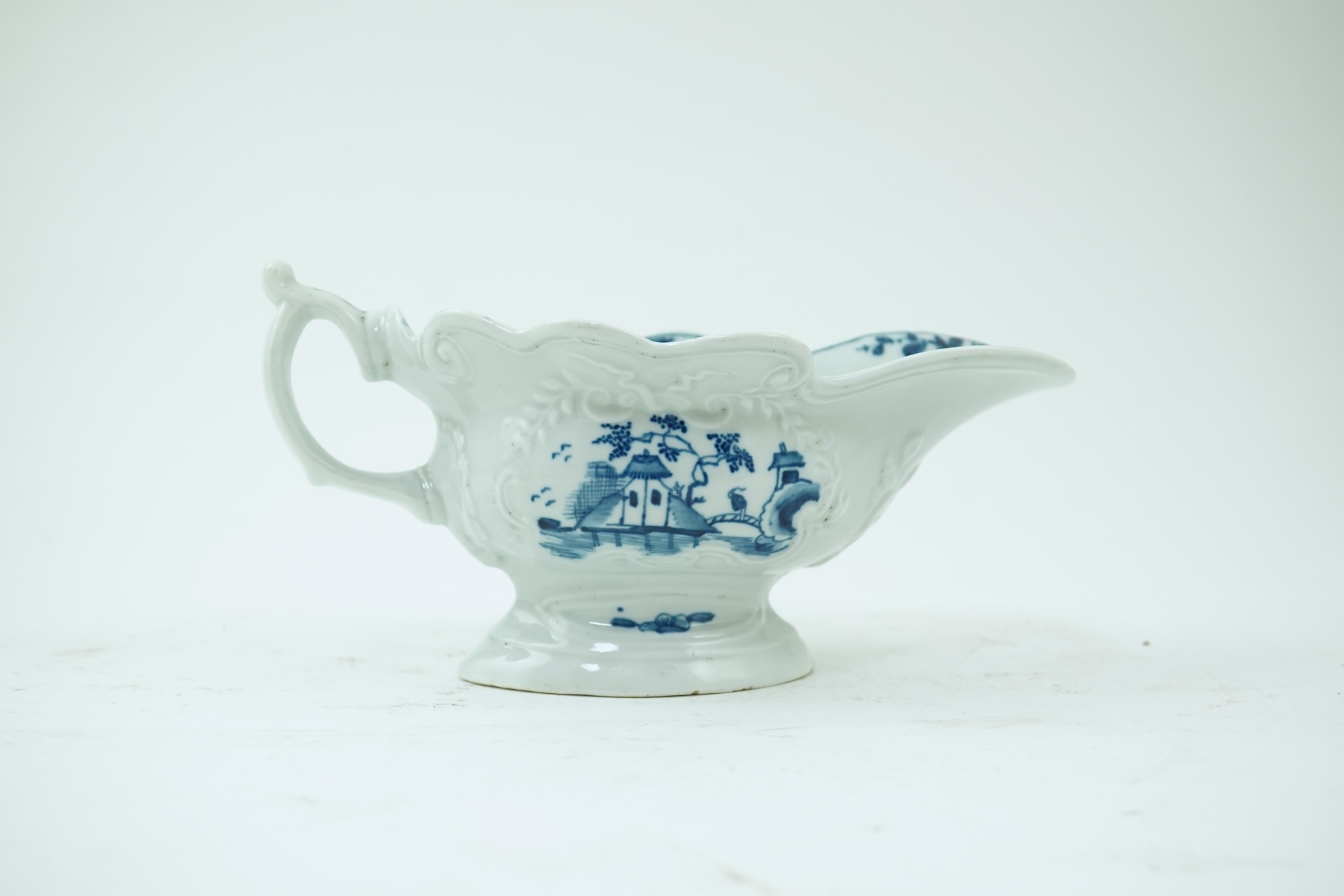 A Worcester blue and white Triangular Platform pattern high footed sauce boat c.1755